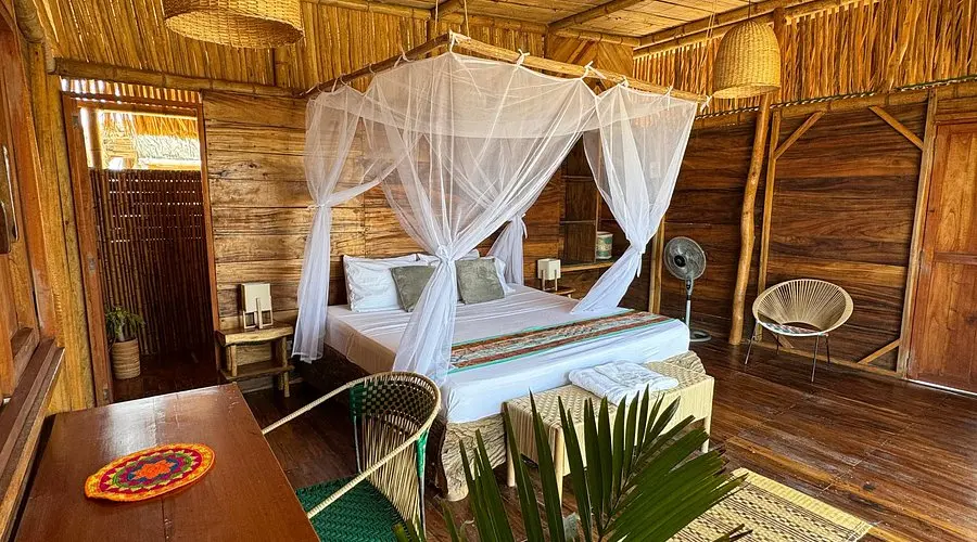 Real interior view of a wooden room at Palaa Ecolodge